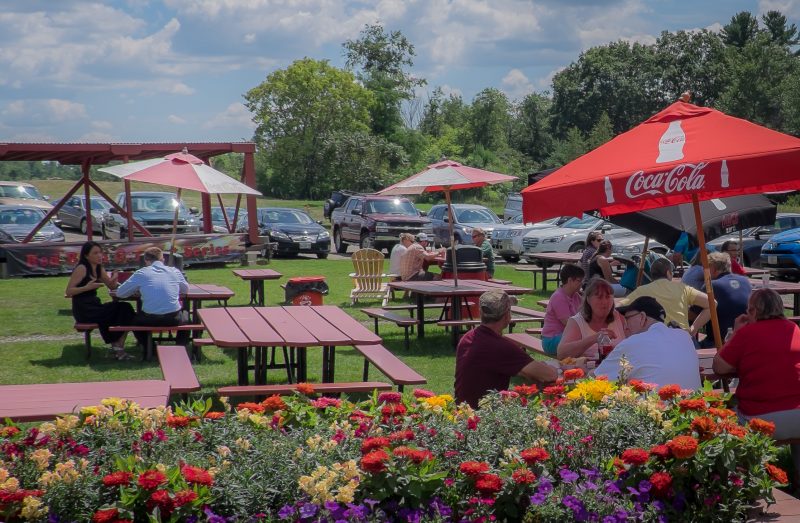 Picnic tables outside The Red Barn, Augusta, Maine