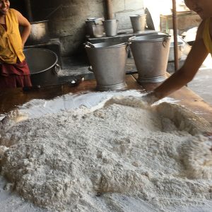 2 boys working the dough